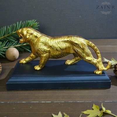 30163
Description:- TIGER ON BASE
Material:- ALUMINUM AND WOOD
Finish:- GOLD
Size:- L.9'' H.5'' W.4''

